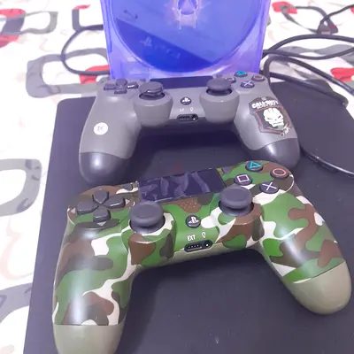 Two Sony PlayStation DualShock / DualSense Style Controllers (Camo + Grey) - Used