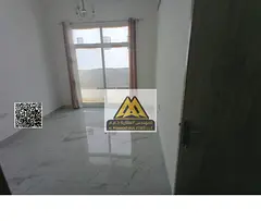 One-bedroom apartment with living room in Al Jurf 3, Ajman, balcony, 2 bathrooms, closed kitchen, ce