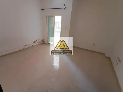 Studio apartment for rent in Al Nuaimiya 2 on King Faisal Street with a separate kitchen, balcony, and central air conditioning at a special price.