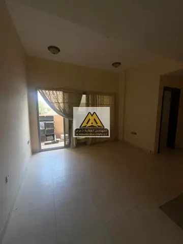 Two-bedroom apartment with a living room and balcony for annual rent – ​​Al Rawda 1, Ajman. Spacious, affordable, and conveniently located.