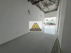 Commercial Shop for Rent in Al Rawda 2 Ajman Spacious Layout Prime Location Suitable for Business Ac