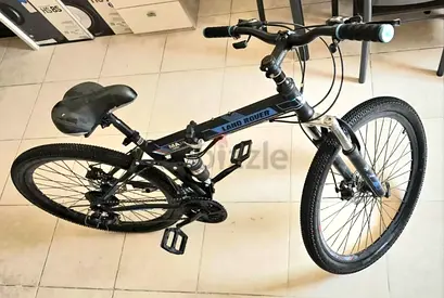 almost new Land Rover 26-inch folding mountain bicycle in black and blue