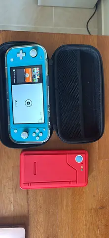Nintendo Switch Lite (turquoise)with protective case, travel case and accessory for games
