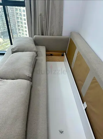 Light grey fabric sofa with under-seat storage, 3-seater