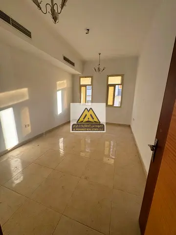 Apartment for rent in Al Alia, Ajman. Strategic location, close to services, new building, family-friendly.