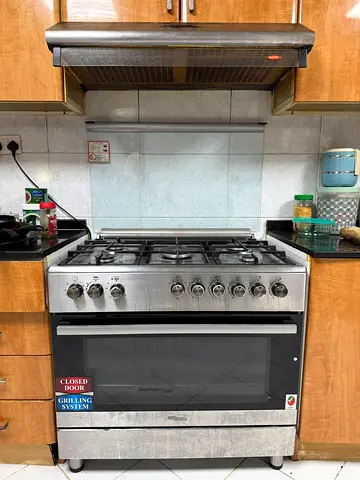 Stainless Steel Gas Range with Oven - Good Working Condition still under warranty