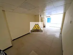 Commercial mezzanine shop in a prime location in Ajman, Al Rashidiya - mezzanine provides additional