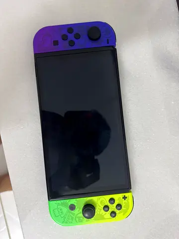 Nintendo switch splatoon 3 edition + micro sd card 128 gb + pro controller + fc24 with original pack