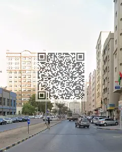 **"Corner Commercial + Residential G+9 Building for Sale in Nuaimiya 2, Ajman"**