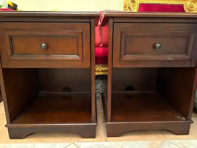 Pair of brown wooden bedside tables with single drawer