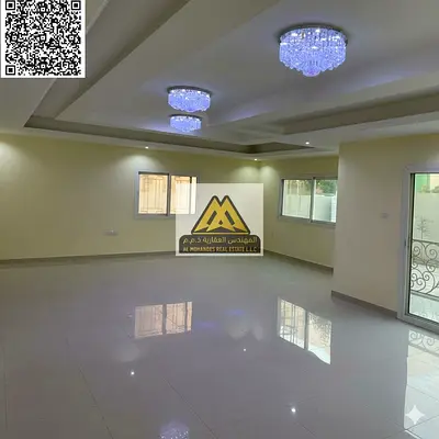 For annual rent: 5 master bedrooms, a living room and hall open to each other, a maid's room, 6 bathrooms, a garden, indoor and outdoor parking, and a