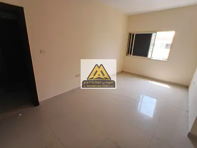 Residential Opportunity in Al Nuaimiya 2: Spacious 2-Bedroom Apartment for AED 24,000 Annually, Near Sharjah Exit