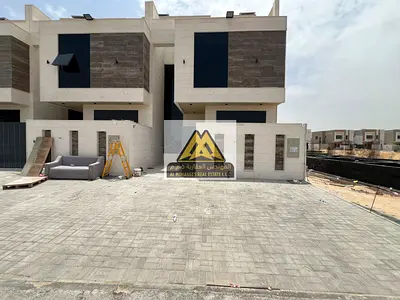 Townhouse Villa for Sale in Al Helio 2 Ajman 5 Master Bedrooms Stone Facade Roof 1.4M AED All Inclusive