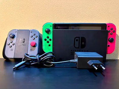 Nintendo Switch with dock, Extra Joy‑Cons, Pro Controller, 5 games, 256GB Memory