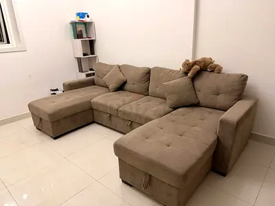 L-shaped beige fabric sofa with two chaise lounges - good condition