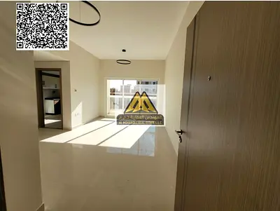 A first-occupant 2-bedroom apartment with a living room for annual rent in Al Jurf 3 – Ajman, featuring a master bedroom, 3 bathrooms, balcony, and a