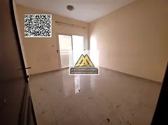 A spacious 1-bedroom apartment with a living room for annual rent in Al Hamidiya – Ajman, featurin