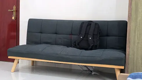 Grey Fabric Sofa Bed / Futon with Wooden Legs - Good Condition