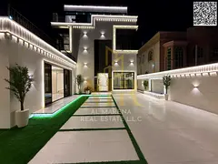 Villa for sale in Al Rawda, second plot from Sheikh Ammar Street, 5000 sq ft, 3 floors, stone exteri