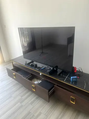 55 Flat Panel Smart TV in Good Condition (With Stand) - Dubai