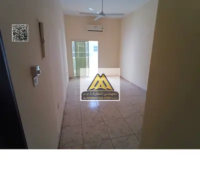 Two-bedroom apartment with living room in Al Rawda 3, Ajman, 2 balconies, 2 bathrooms, maintenance by owner, Sheikh Ammar Street, AED 45,000 in 4 inst