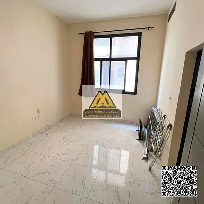 Studio apartment in Al Jurf 3, excellent location in a new and clean building, with a semi-separate kitchen and central air conditioning, close to all