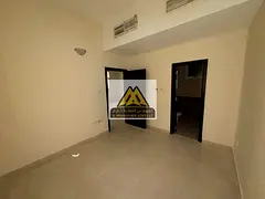 Apartment in Al Jurf 1, Ajman, 2 bedrooms and living room, 2 bathrooms, central AC, spacious layout,