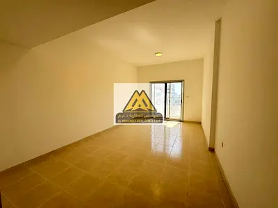 For annual rent: A two-bedroom apartment with a separate living room in Al Nuaimiya 1 Industrial Area, Ajman. The apartment is located in a very vibra