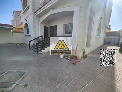 Commercial villa in Al Muwaihat 2, suitable for commercial activity, featuring spacious areas, elegant design, and an excellent corner location.