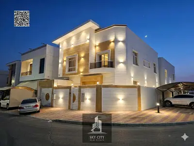 Two-story duplex villa with a luxurious design in Al Yasmin – located on two streets behind a mosque, with a price including electricity, water, and a