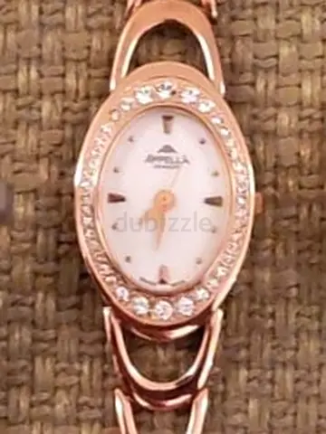 Rose gold womens bracelet watch with crystal bezel