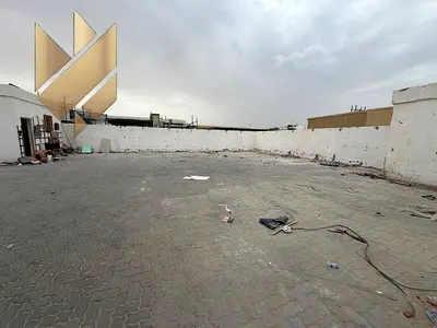 Spacious Industrial Yard in Sajaa – 10,000 Sq. Ft. with Office, Utilities & Ready for Operations