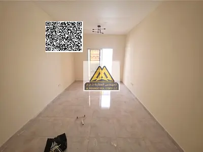 A spacious 1-bedroom apartment with a living room for annual rent in Al Hamidiya 1 – Ajman, located on University Street. It features an open view, a