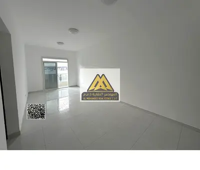 One-bedroom apartment with living room for rent in Al Jurf 2, Ajman, second tenant, master bedroom, 2 bathrooms, balcony with view, prime location nea