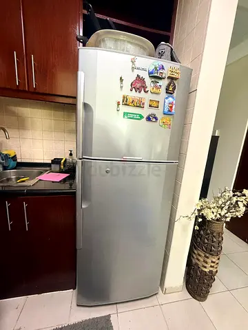 Silver Double-Door Refrigerator - Good Working Condition
