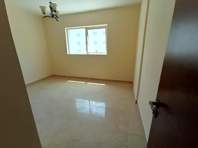 Cheapest one-bedroom apartment for annual rent in Al Qulaya, Sharjah. Central air conditioning, 2 b