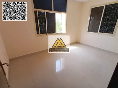 A 1-bedroom apartment with a living room for annual rent in Al Nuaimiya 2 – Ajman, featuring a spacious layout and split AC, located in a prime area c