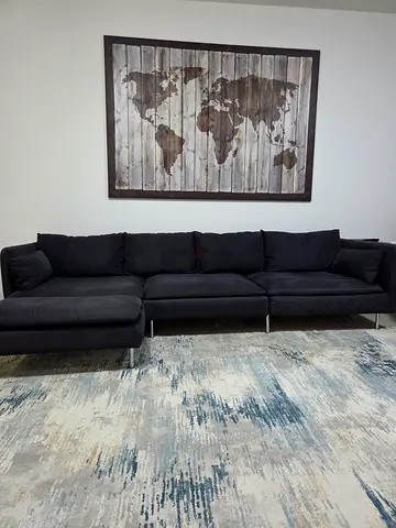 Large dark gray sectional sofa - good condition.