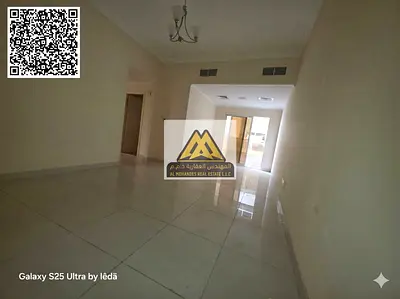 For annual rent: A two-bedroom apartment with a living room in Al Nuaimiya 1, Ajman, located in a vibrant area close to all services and amenities.