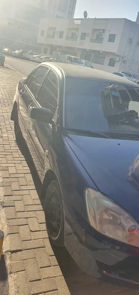 Mitsubishi Lancer EX 2005 — photo 1 of 4