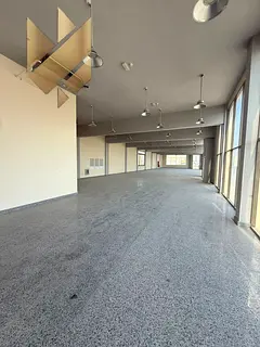 Showrooms, shops, and a yard available for rent in Industrial Area 5, Sharjah, with a total area of