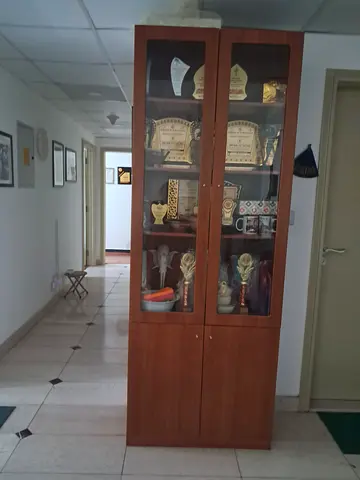 10 ft high solid wood new showcase with storage place below