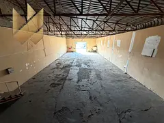 A block for rent consisting of two warehouses and an open yard