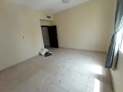 Located in Al Qulaya, Sharjah, a large and luxurious two-bedroom apartment with a living room, two b