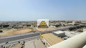 Studio with parking and balcony in Garden City Towers, easy access to Dubai and Sharjah.