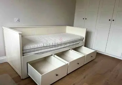 IKEA Hamnes Day bed with 3 storage drawers underneath and with 2 IKEA mattresses