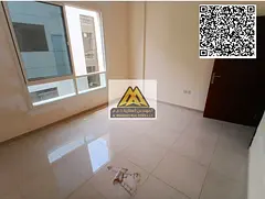 A 1-bedroom apartment for annual rent in Al Hamidiya 1 – Ajman, featuring a balcony and central ai