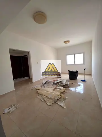 Enjoy a distinctive apartment at a reasonable price. A spacious two-bedroom apartment with a living room is available for rent in Al Jurf 2, near the