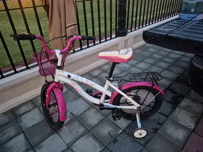 Kids Pink  White Bicycle with Training Wheels and Basket - Good Condition