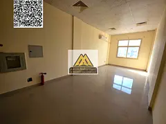 Studio apartment for rent in Al Jurf, Ajman, with a very large area and a semi-separate kitchen, loc